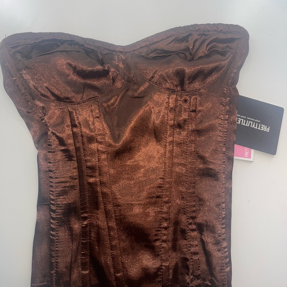 Brand new pretty little things strapless top tags still on